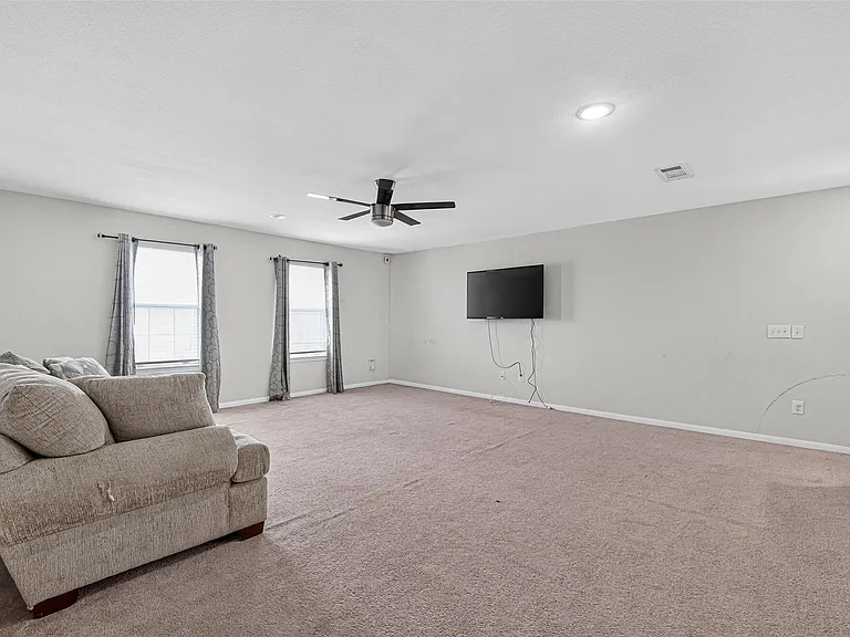 7031 Hobby Wind Ridge Dr — Photo 37