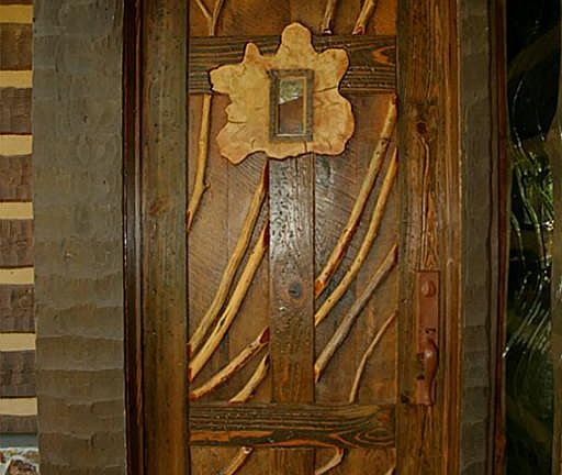 Entrance door carved by an area artisan.