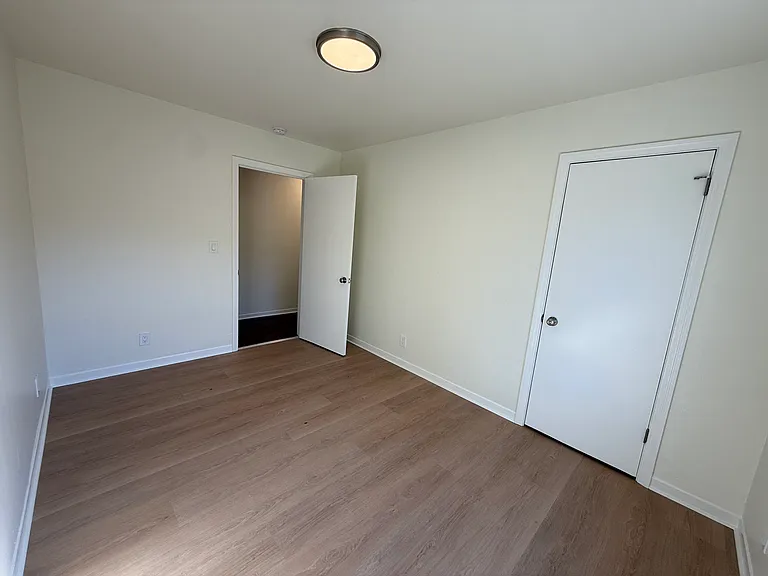 Bedroom #2 is cozy with a single door closet.