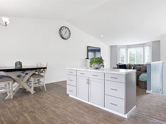Not your typical split-entry house, with the desirable open floor plan and soaring, vaulted ceilings.