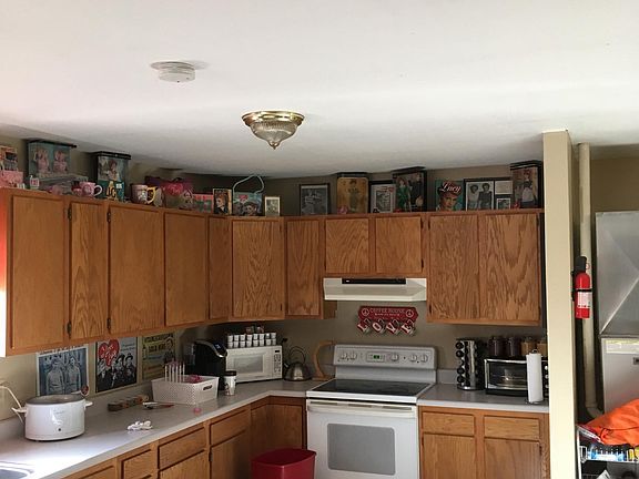 Kitchen includes stove and refridgerator