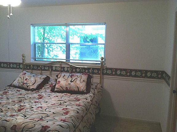 Spacious master bedroom has two closets.
