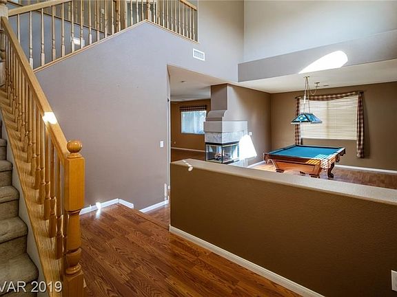 Entryway looking to formal dining room.
