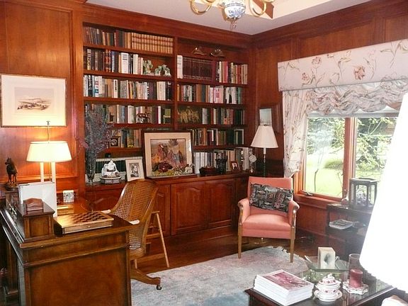 Just off the Entry a Fully Wood Encased Cherry Lined Library awaits you and your Guests.