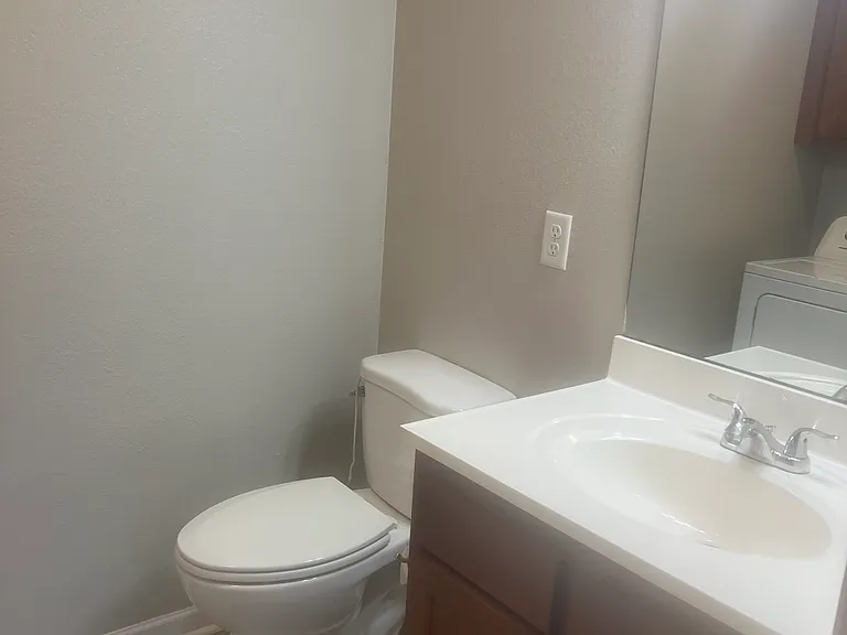 another angle of laundry/ 1/2 bath downstairs.