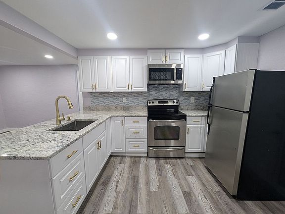 2nd image of 1028 E 93rd Ave