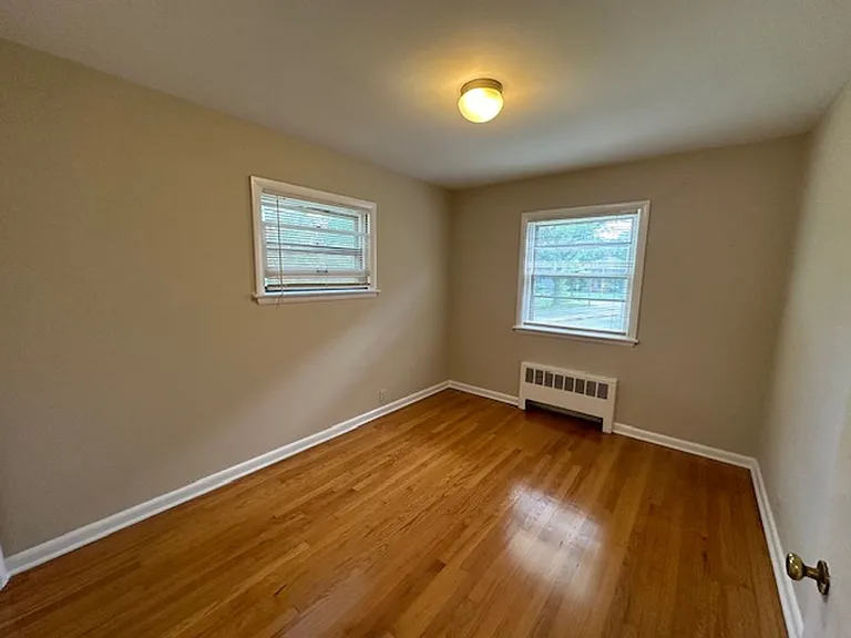 Cozy 1BR in Riverwest $925 Heat Included | Hardwood Floors | Storage + Laundry — Photo 18