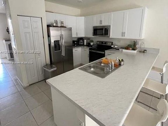 2nd image of 10589 W 33rd Ln #10589