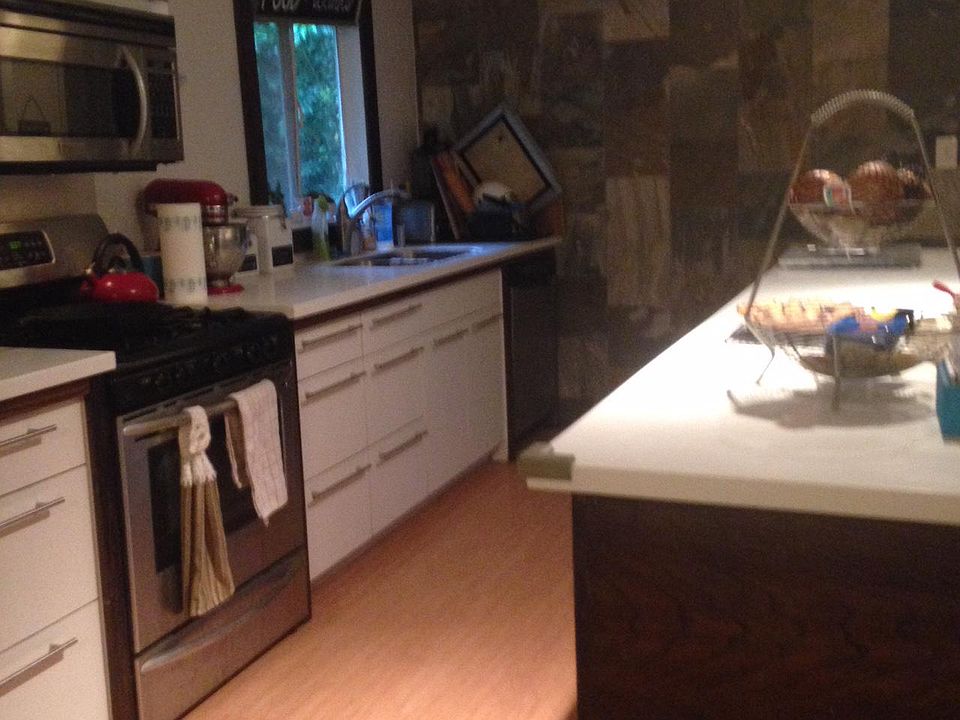Huge kitchen with loads of counter space and stainless appli