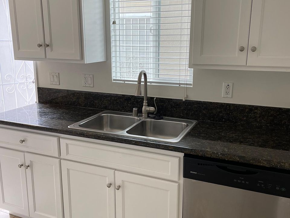 Granite counter tops. The sink has a disposal.