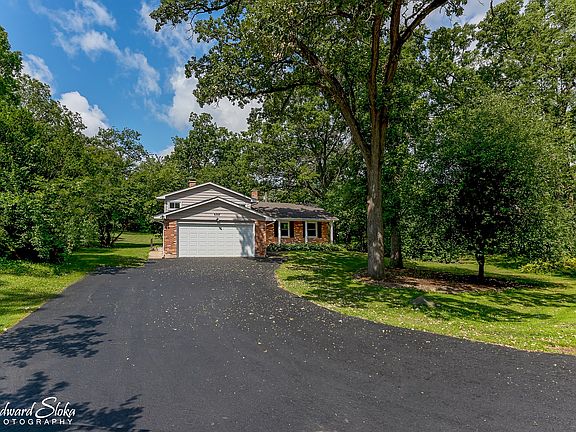 Extra wide 3 car drive makes room for the toys!