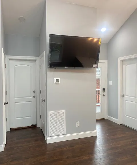Large flat TV in living room.