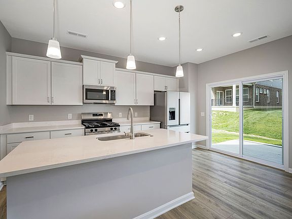 Modern Kitchen with Cabinets and Brand new stainless steel appliances