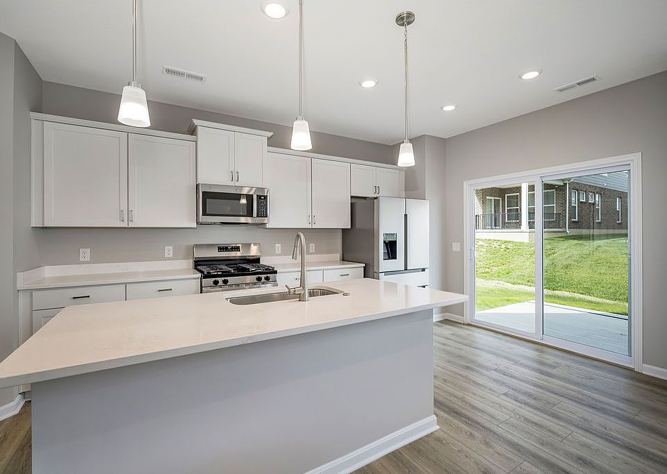 Modern Kitchen with Cabinets and Brand new stainless steel appliances