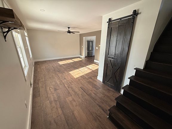 Renovated Living Room in 2024/2025, including added coat closet and high end LVT flooring throughout the 1st floor