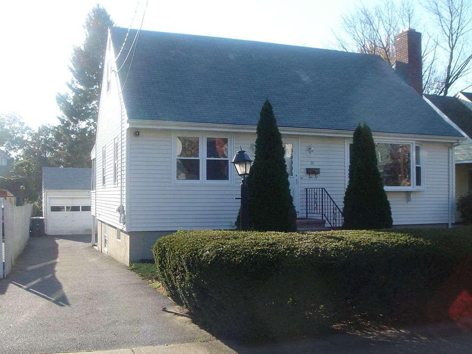 Frontal view w/ 2 car garage