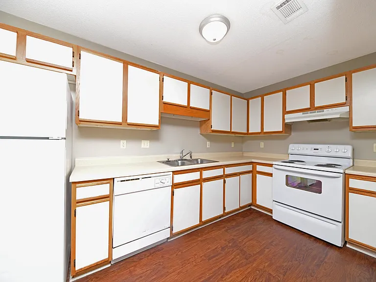 Kitchen area with ample cabinetry & counter space