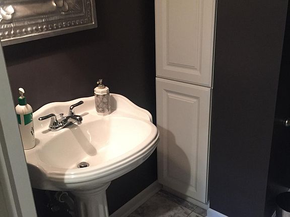 basement bathroom - marble floor and shower