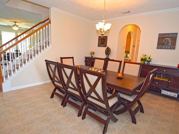 The dining connects to the kitchen for easy use...