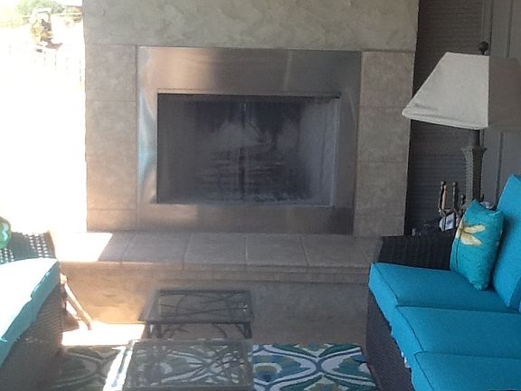 Wood fireplace in lanai