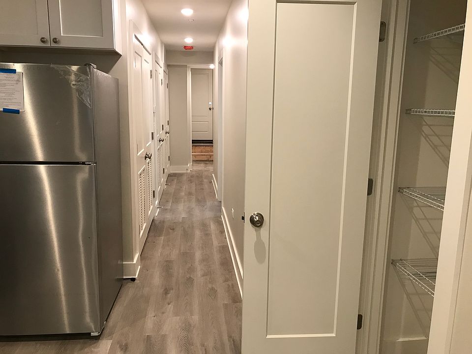 Pantry to right/Hallway to bedrooms and second bath