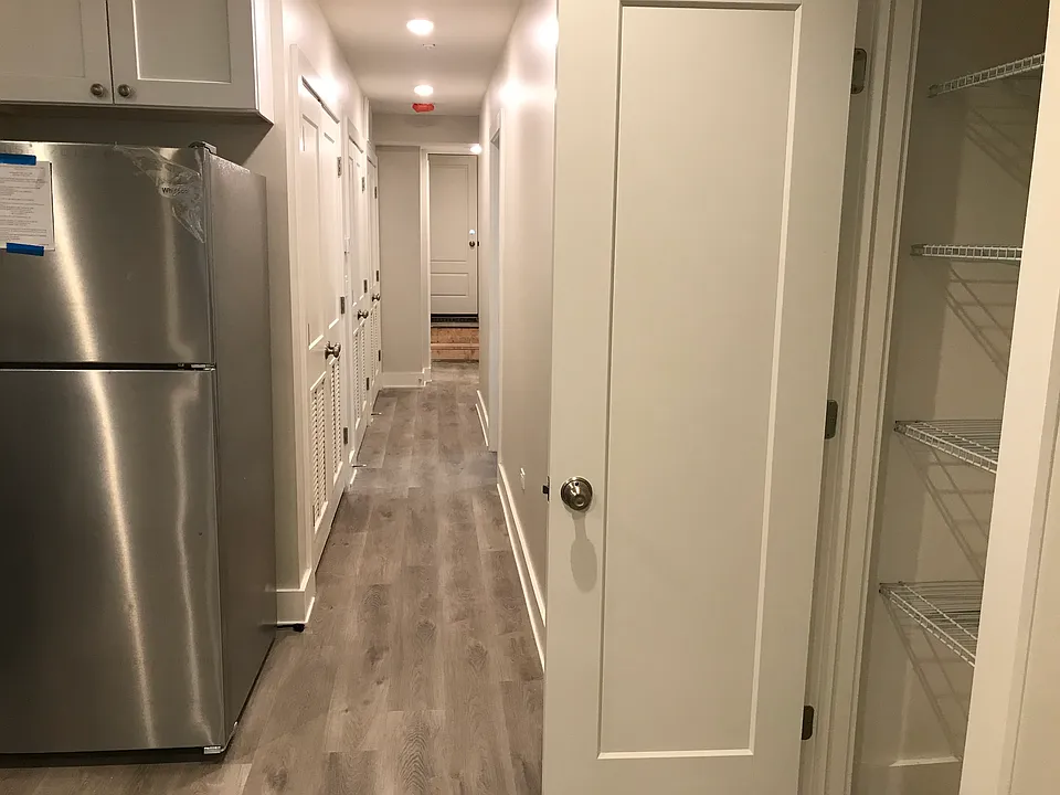 Pantry to right/Hallway to bedrooms and second bath