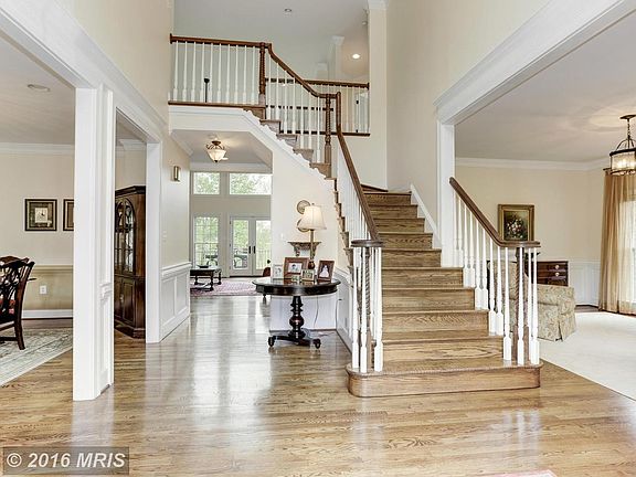 Enter the stunning center hall with all hardwoods