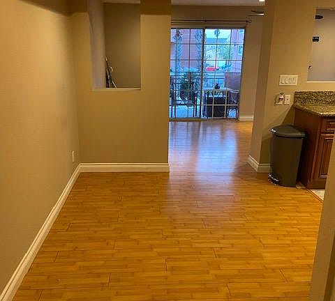Hallway across from washer/dryer (with overhead lights)
