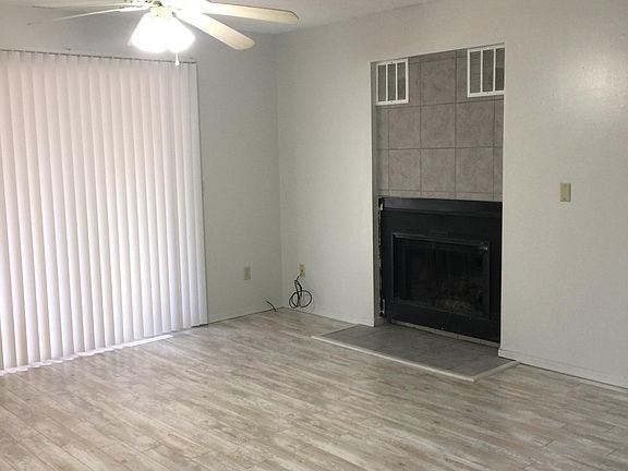 livingroom with wood burning fireplace