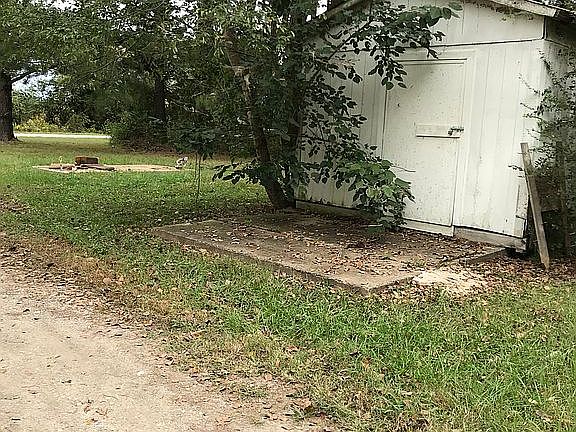 Older Storage bldg. Slab to 
N. for a well house.