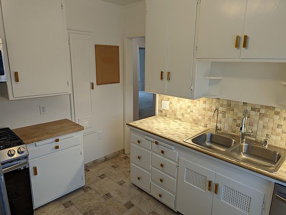 Brand new, Samsung dishwasher, built-in gas range, over the range microwave and gently-used refrigerator/freezer. New faucet and garbage disposal.