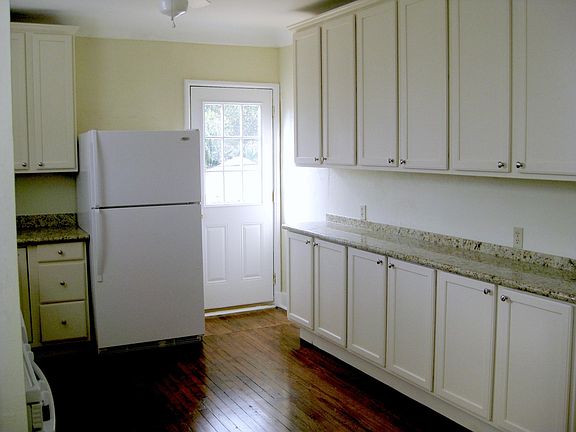 Kitchen with door to rear deck