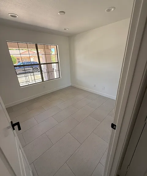 3rd Bedroom with mirrored closet doors