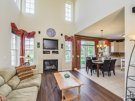 The 2 story family room is just as impressive.  The large windows let in tons of natural light.