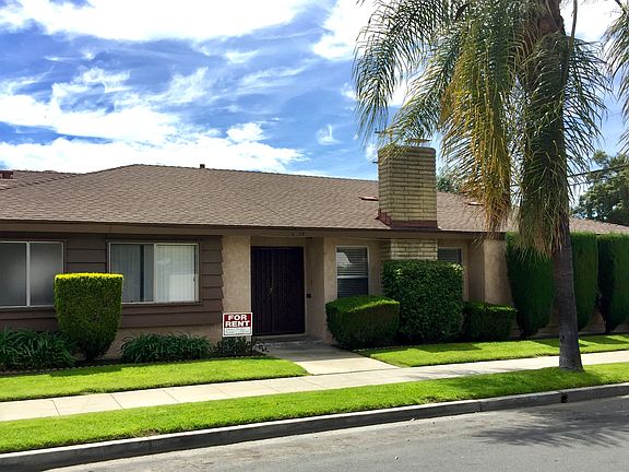 Front, beautifully kept landscaping