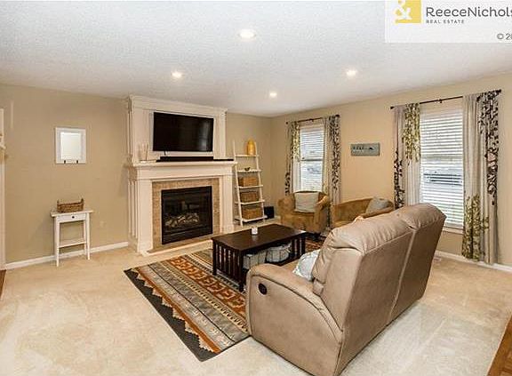 You can add to the cozy feel by firing up the gas log fireplace!