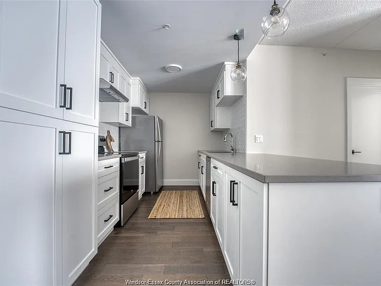 4578 Huron Church Line Rd #205 — Photo 13