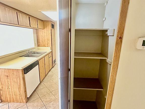 From hallway, leading to kitchen with pantry.