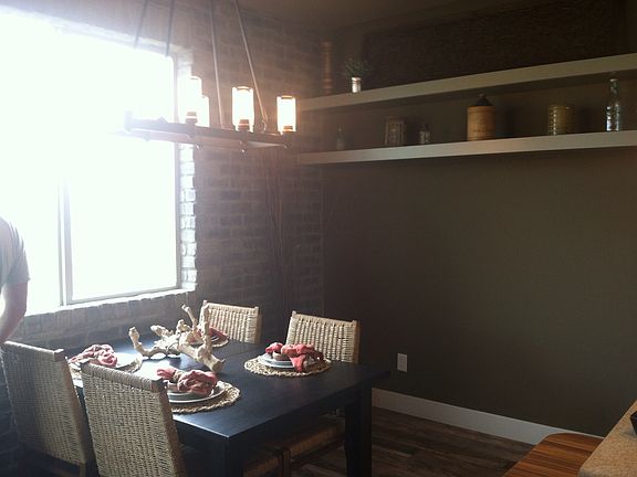 Brick accent wall in dining 
