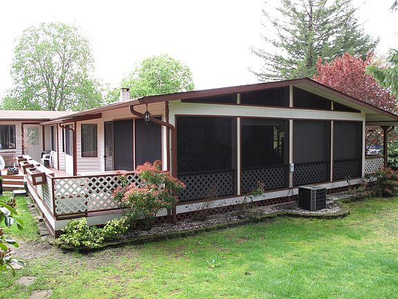 Screened sunroom and huge backyard deck