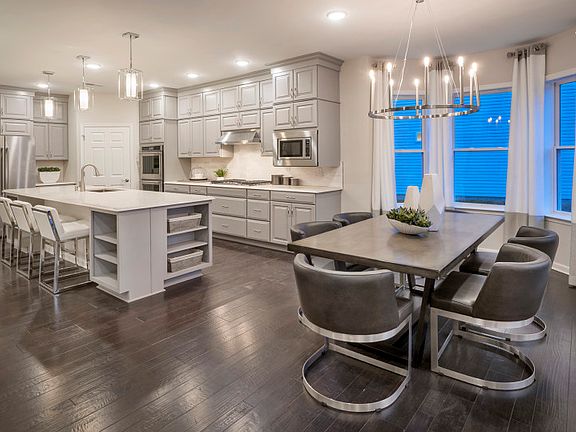 Open layout featuring kitchen and cafe