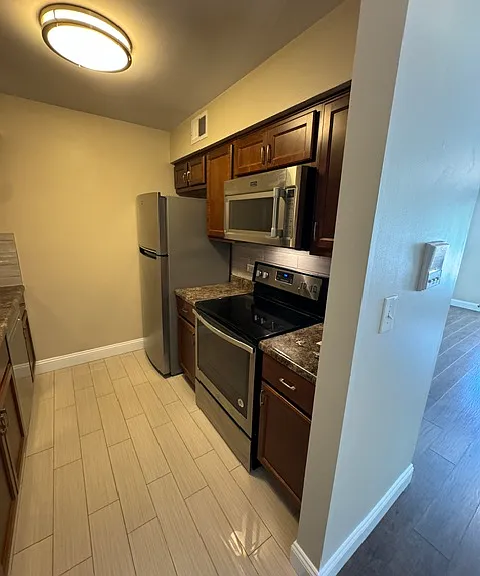 6163 Knoll Wood Rd #203 — Photo 4