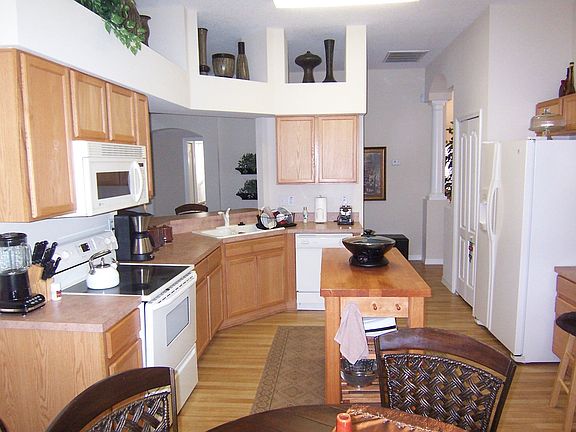 Semi-open kitchen keeps you connected.