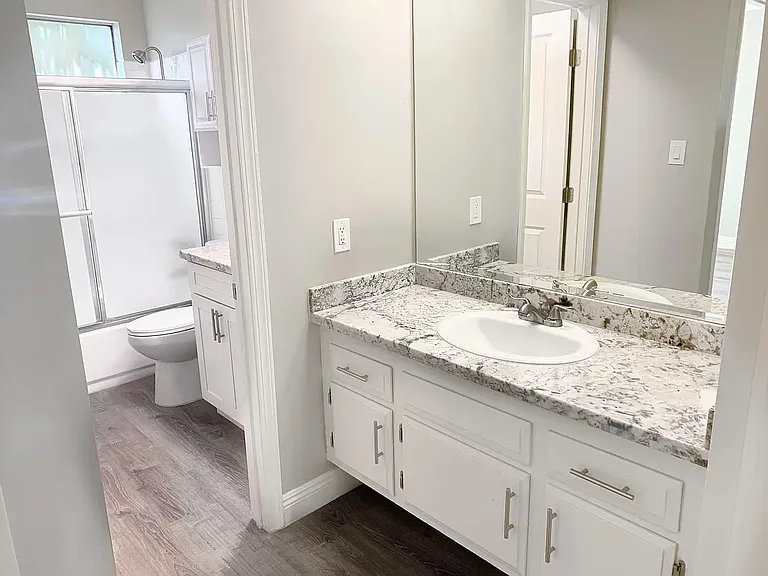 2 BEDROOM HALLWAY AND BATHROOM VIEW