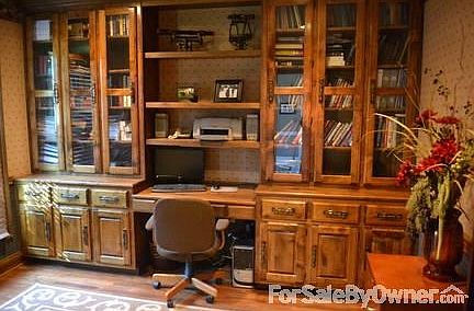 Study/Office
						:
						Custom Built-ins with hardwood floor