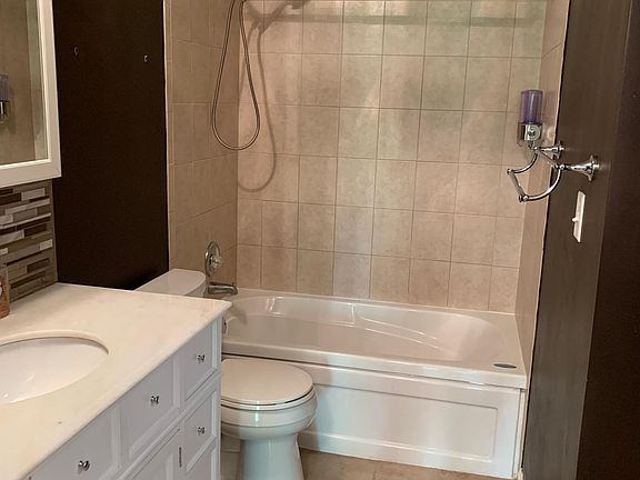 Shower with whirlpool tub