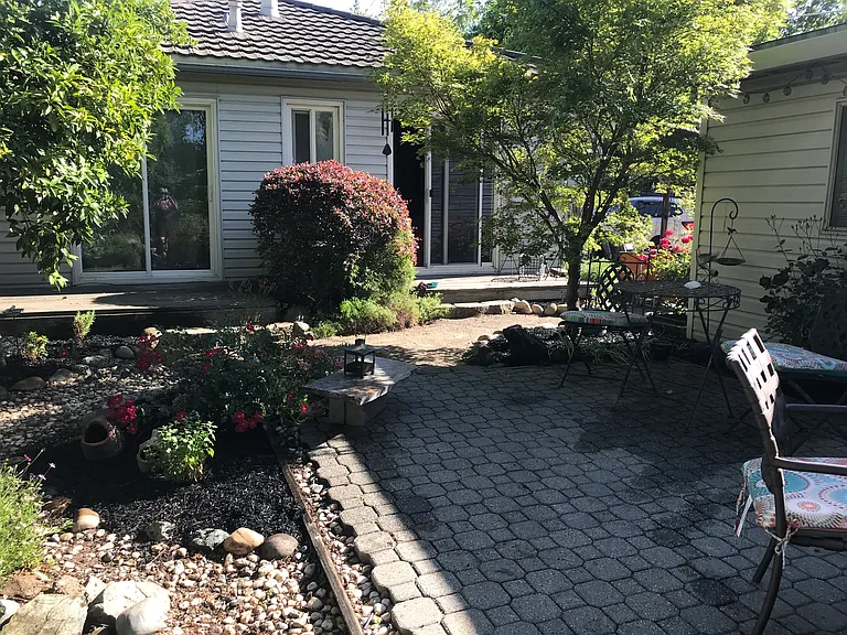 Patio looking at bedroom sliders.