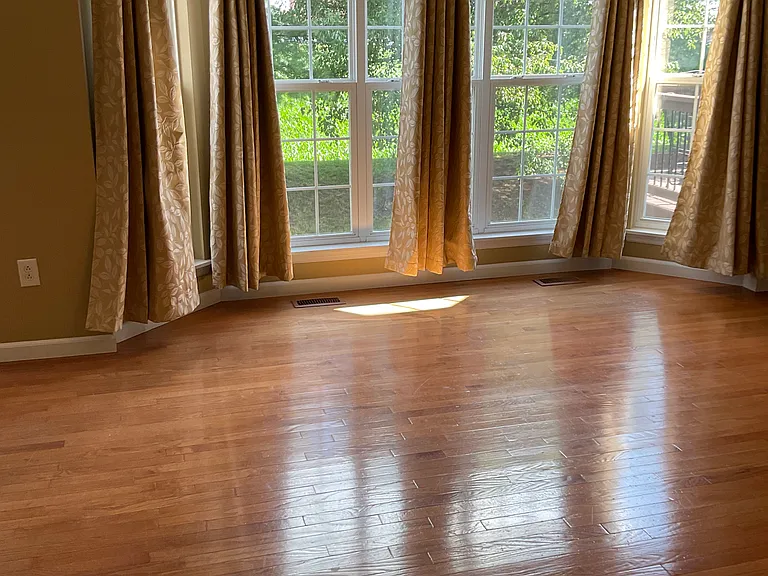 Living area with bright bay window