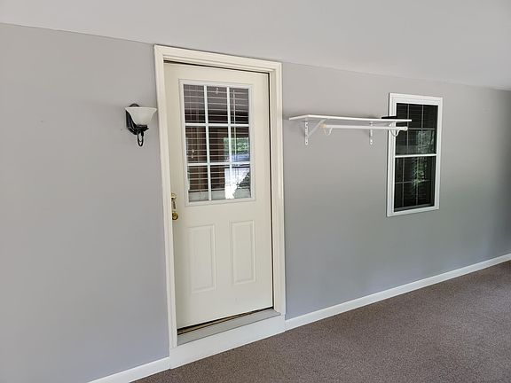 Convenient Spot for Coats & Shoes by the Front Door!