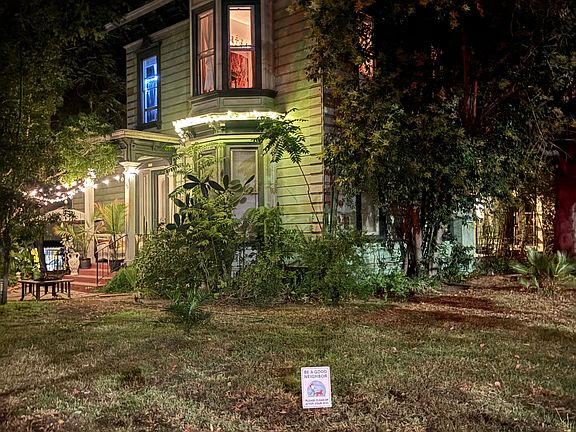The unit is on the side street of this corner property to the bottom right.
